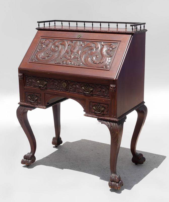 Appraisal: VICTORIAN MAHOGANY CARVED SLANT FRONT DESK Early th century top