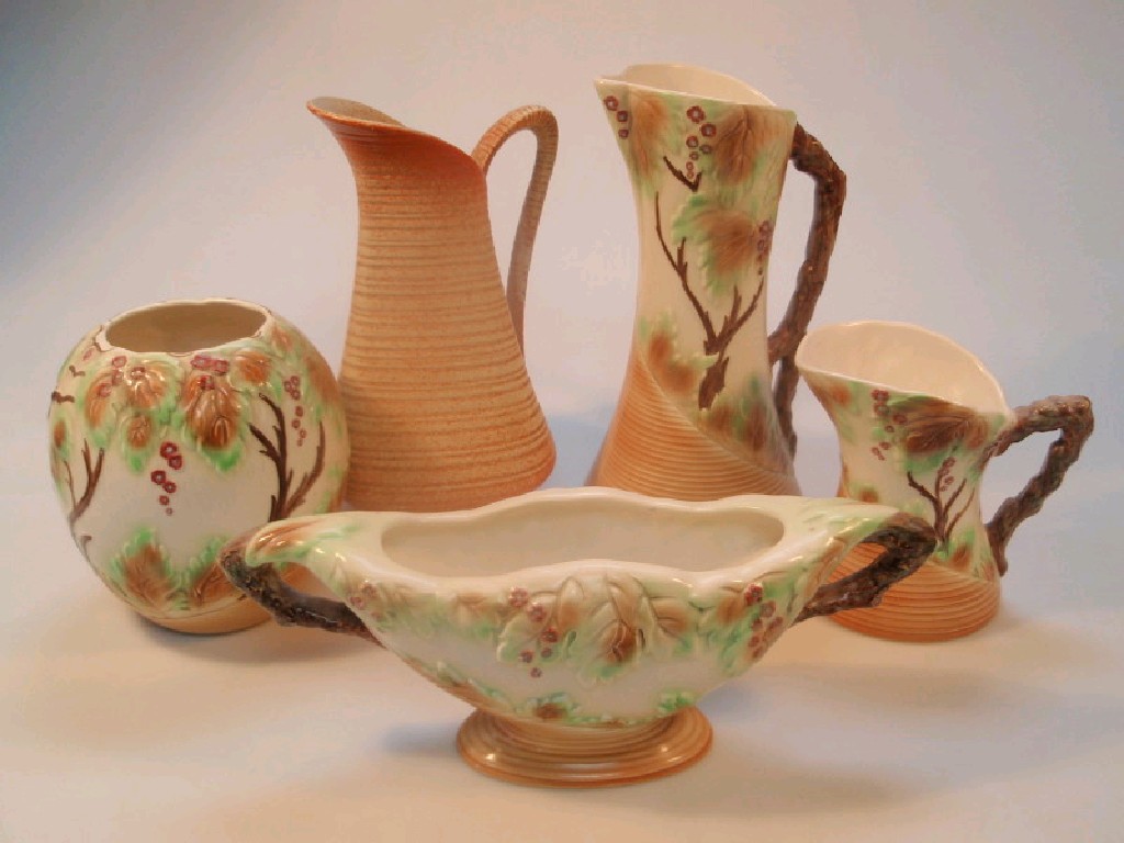 Appraisal: A Sylvac jug shape the ribbed ground with orange mottled