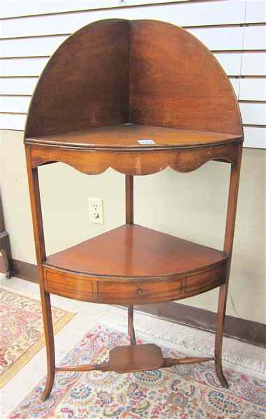 Appraisal: SHERATON STYLE MAHOGANY CORNER WASHSTAND English th century a -tier