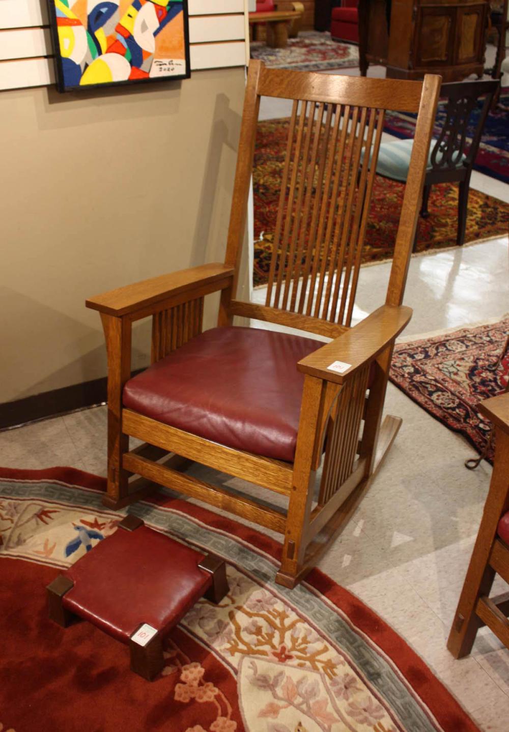 Appraisal: STICKLEY OAK SPINDLE ROCKER AND FOOTSTOOL Mission Collection rocker model