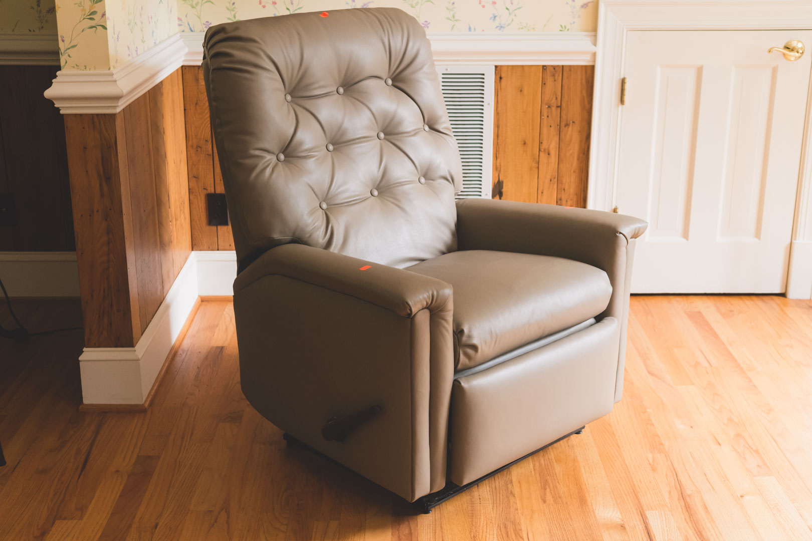 Appraisal: Leather upholstered reclining chair in H in W