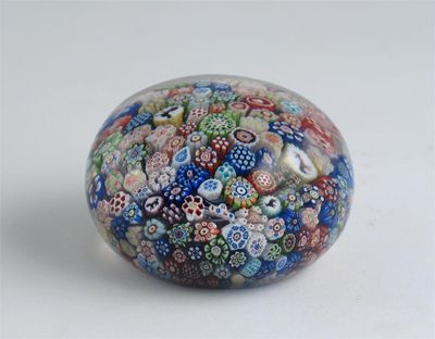 Appraisal: A Baccarat paperweight set with millefiori canes including the date