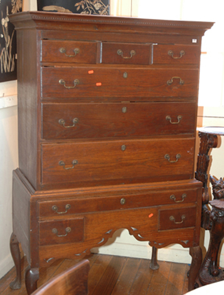 Appraisal: A GEORGE III OAK CHEST ON STAND The dental cornice