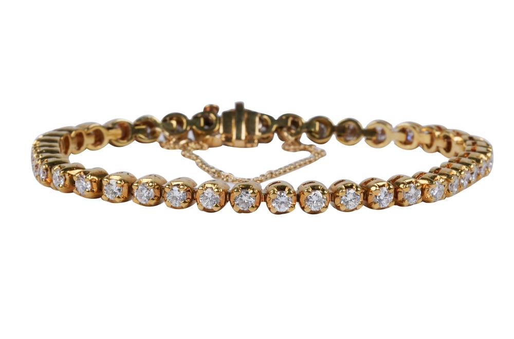 Appraisal: KARAT YELLOW GOLD DIAMOND LINE BRACELETcontaining full cut diamonds H-J