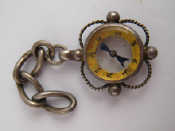 Appraisal: A silver fob compass with glass on both sides circa