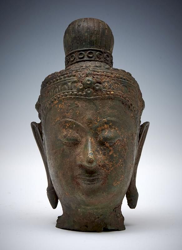 Appraisal: Bronze Buddha head with gilt remnants Bronze Buddha head with