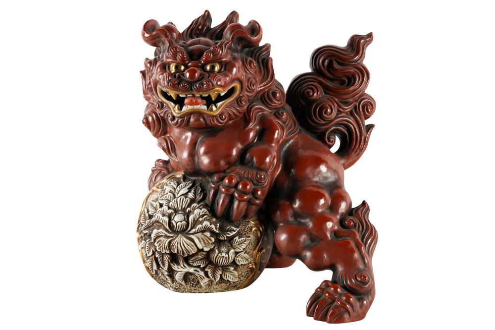 Appraisal: JAPANESE RED GLAZED FOO LIONceramic with character marks to underside