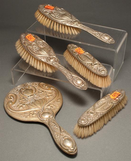 Appraisal: American silver-plated vanity set in the repousse style early th