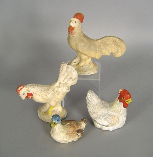 Appraisal: Two chalk roosters together with a hen and duck tallest