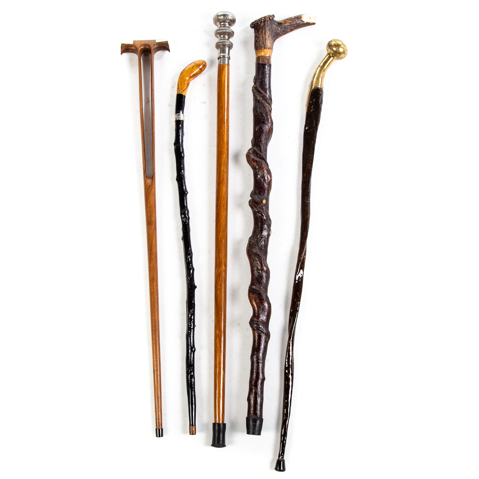 Appraisal: FIVE ASSORTED WOOD CANES WALKING STICKS Includes lacquered wood shaft