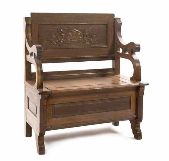 Appraisal: An American Oak Hall Bench the back panel carved with