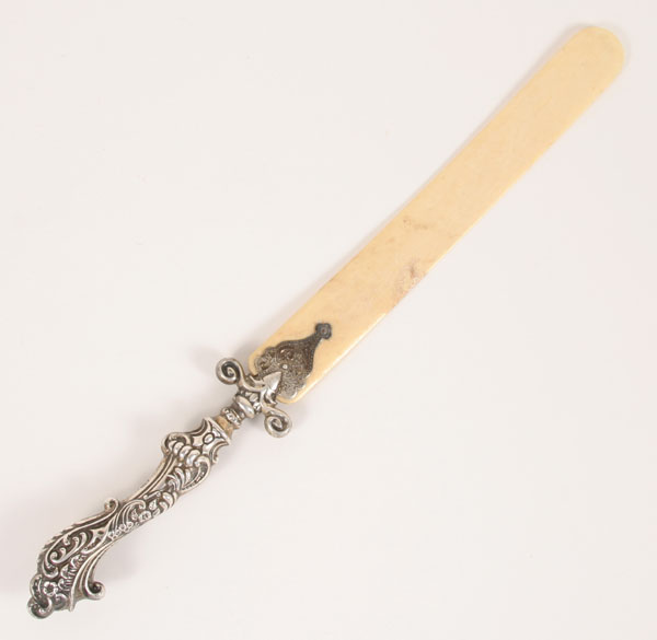 Appraisal: Victorian elephant ivory page turner sterling handle with embossed floral