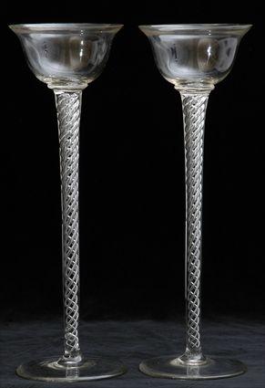 Appraisal: PAIR OF LARGE CLEAR AIR TWIST COMPOTES Each bell-form bowl