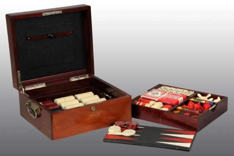 Appraisal: Mahogany Game Box Description Circa With poker chips checkers chess