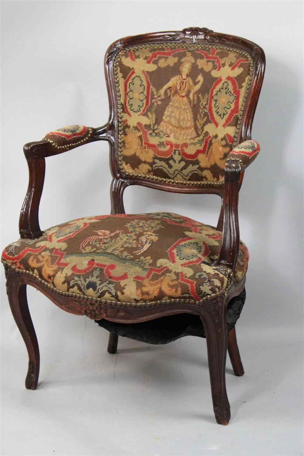 Appraisal: LOUIS XV CARVED BEECHWOOD NEEDLEPOINT COVERED FAUTEUIL EN CABRIOLET th