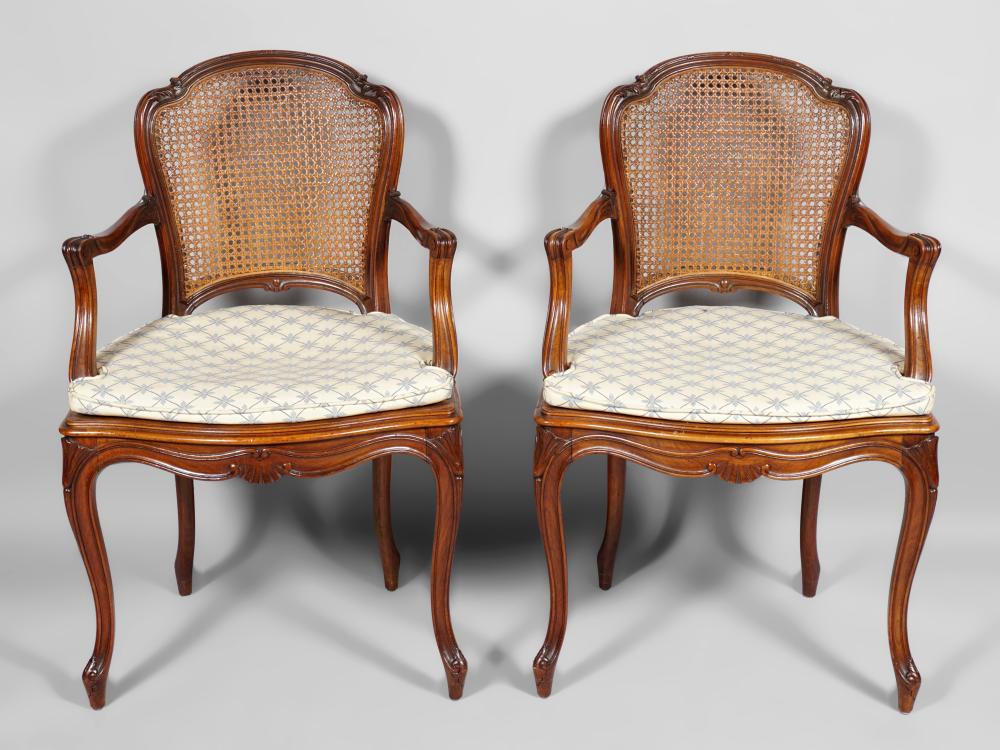 Appraisal: PAIR OF LOUIS XV STYLE WALNUT FAUTEUILS both with cartouche