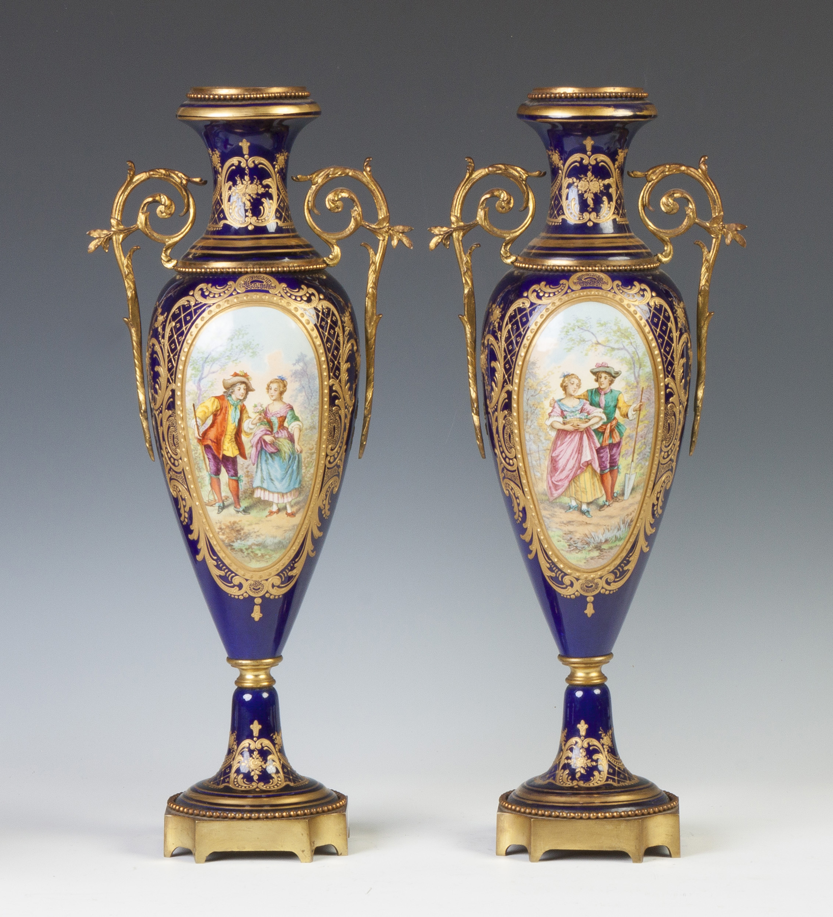 Appraisal: Pair of Sevres Style Hand Painted Urns Late th cent