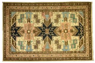 Appraisal: A TRIBAL SERAPI DESIGN RUG A TRIBAL SERAPI DESIGN RUG