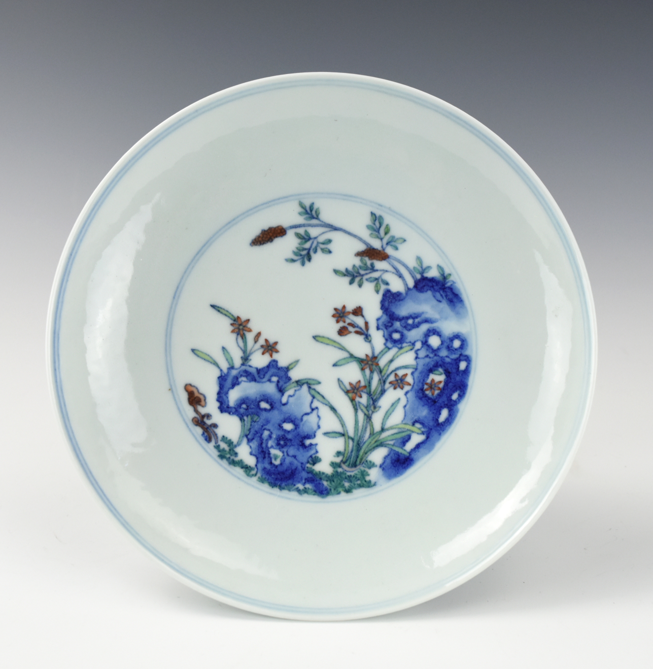 Appraisal: CHINESE FLOWER DOUCAI PLATE W YONGZHENG MARK decorated to the