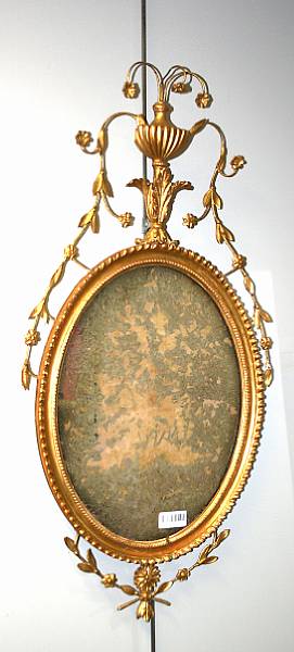 Appraisal: A late George II early George III style giltwood mirror