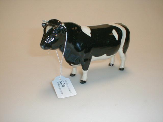 Appraisal: A Beswick Fresian bull ch Coddington Hilt Bar designed by