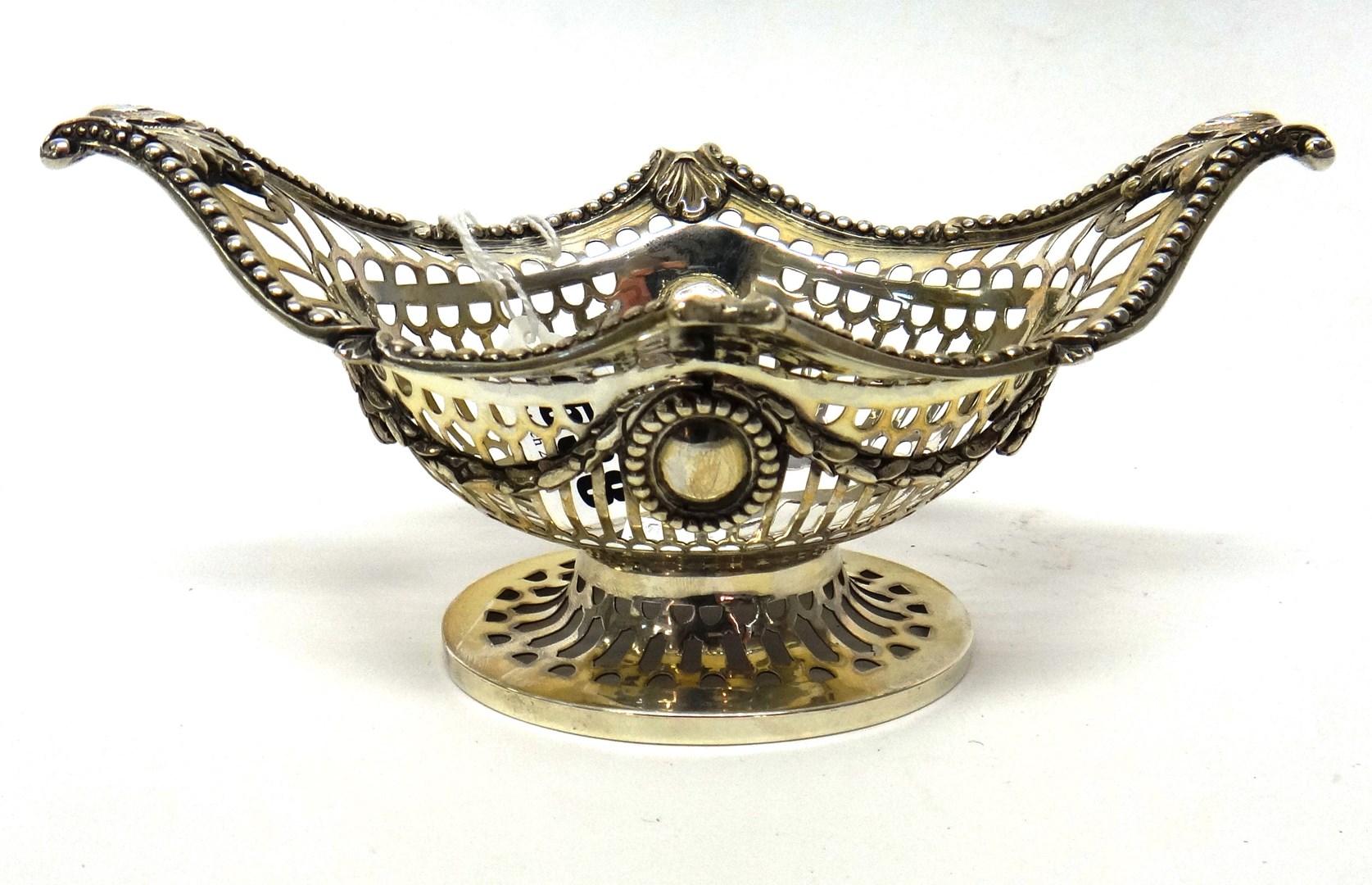 Appraisal: A late Victorian silver bonbon basket of twin handled boat