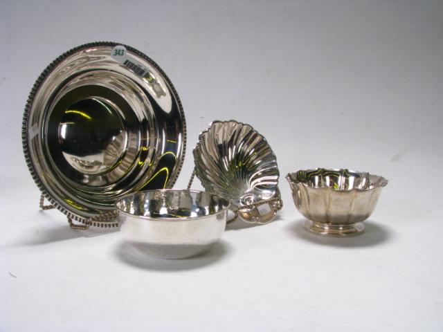 Appraisal: Four sterling silver bowls including shell motif dish two condiment