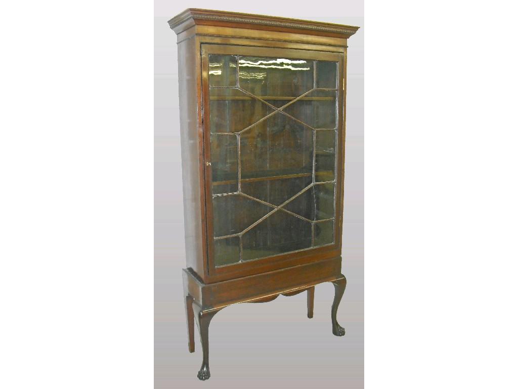 Appraisal: Georgian style mahogany display cabinet on stand the moulded cornice