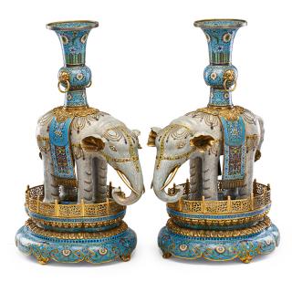 Appraisal: PAIR OF CHINESE CLOISONNE ELEPHANTS Standing on lotus-form gilt bronze