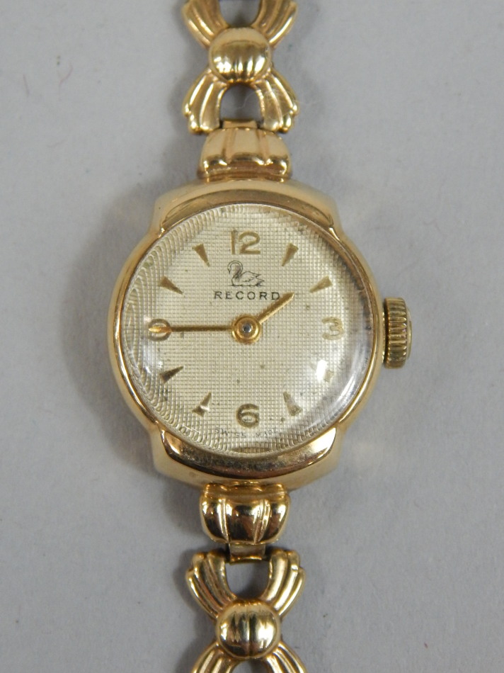 Appraisal: A ct gold Record ladies wristwatch with circular dial inscribed