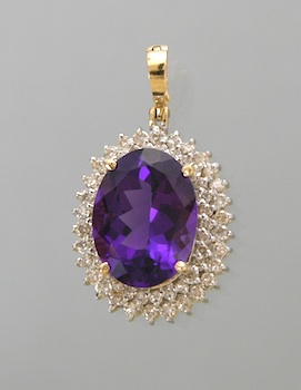 Appraisal: A Ladies' Amethyst and Diamond Pendant k yellow and white