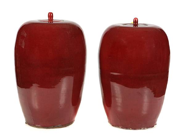 Appraisal: A pair of Chinese oxblood glazed jars with covers height