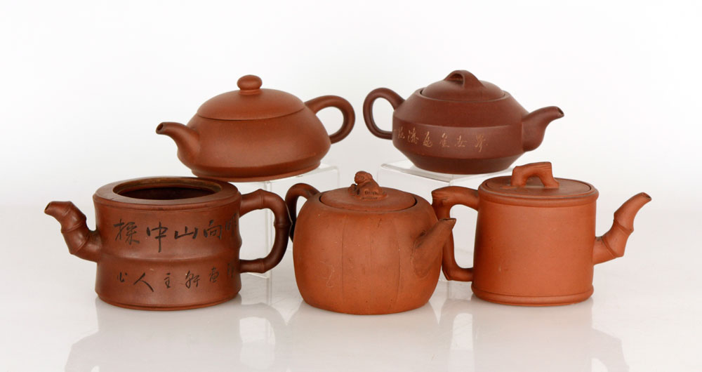 Appraisal: - Chinese Yixing Teapots Lot of five Chinese yixing teapots