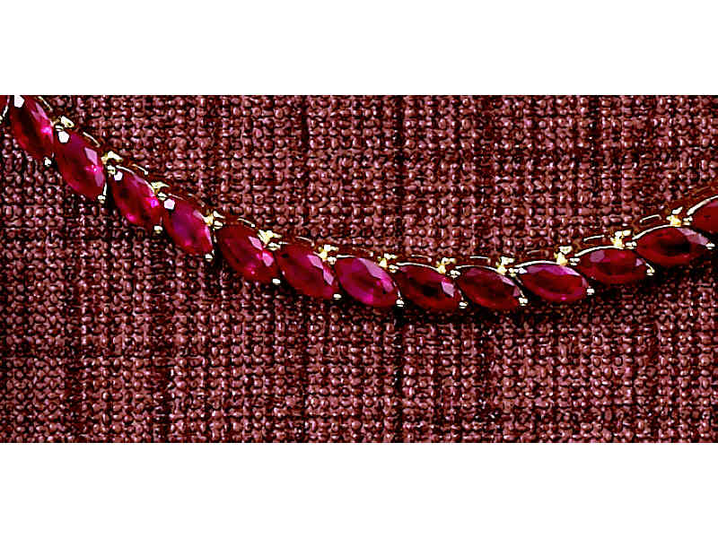 Appraisal: RUBY BRACELET k yellow gold bracelet set with thirty-eight marquise