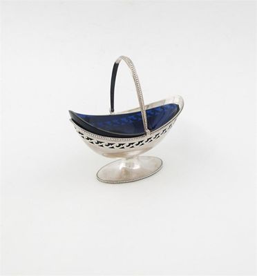 Appraisal: A George III boat shaped sugar basket with bead borders