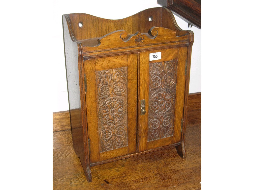 Appraisal: Carved oak cabinet