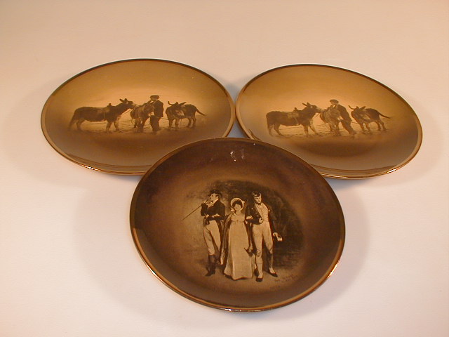 Appraisal: A pair of Ridgways pottery wall plates each painted with