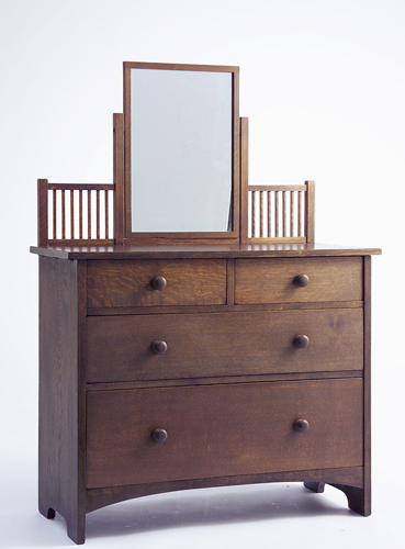 Appraisal: GUSTAV STICKLEY Child's dresser with drawers in two-over-two configuration round