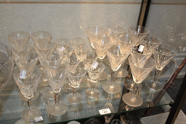 Appraisal: A SUITE OF WATERFORD FLUTED GLASSES to include ten large