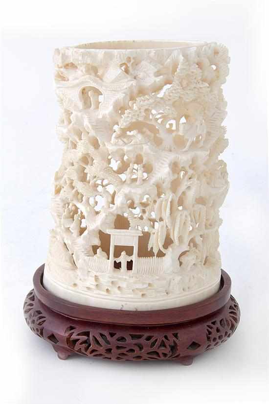 Appraisal: Chinese pierce-carved ivory tusk th century intricate mountainous architectural landscape