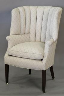 Appraisal: Contemporary upholstered barrel back armchair Contemporary upholstered barrel back armchair