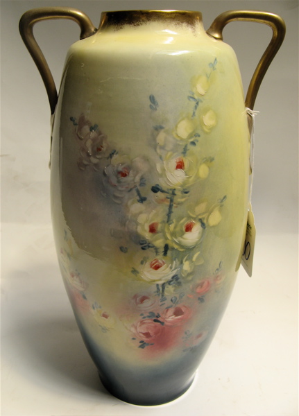 Appraisal: AN AUSTRIAN PORCELAIN FLOWER VASE c with gilt shaped handles