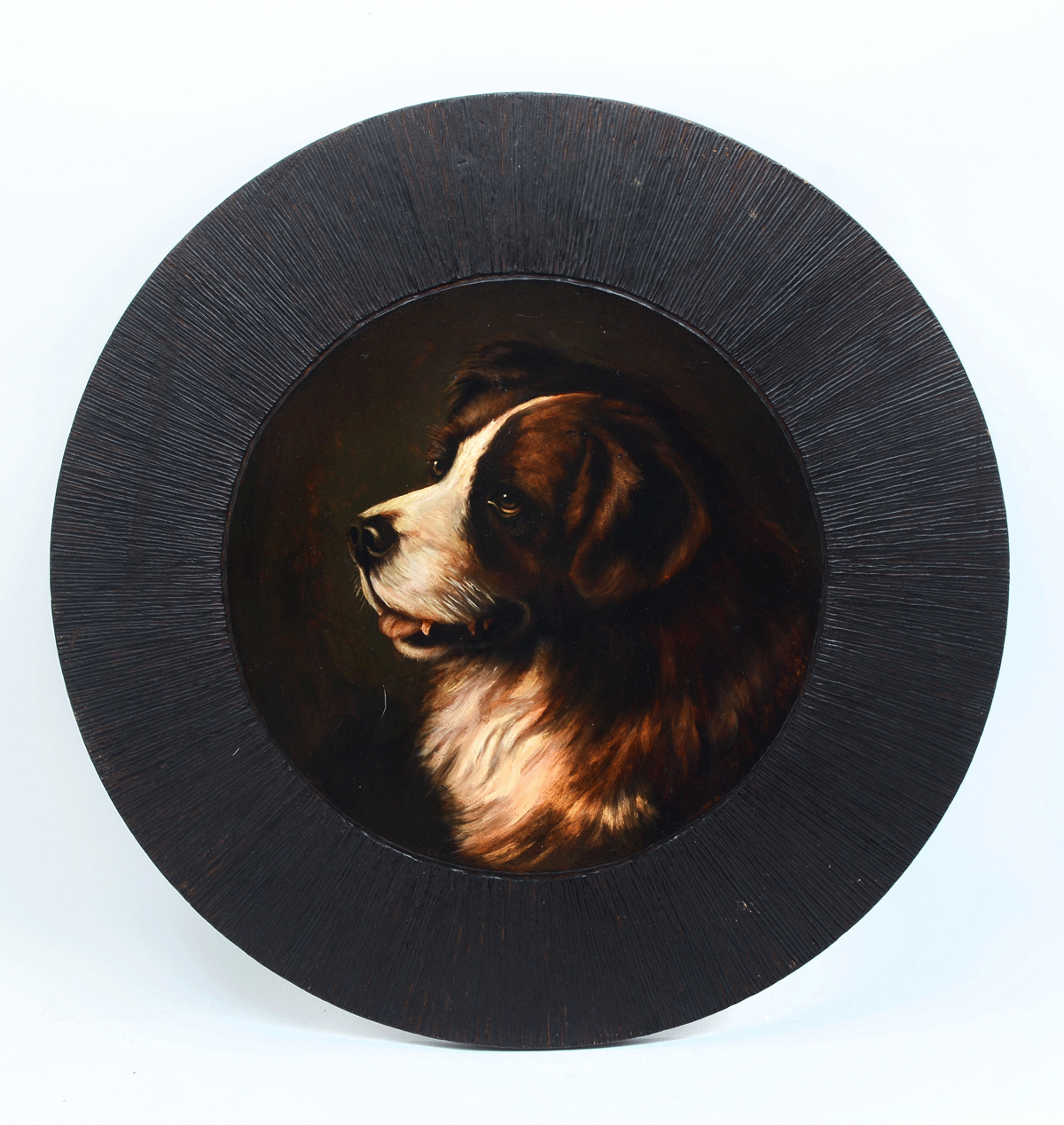 Appraisal: UNSIGNED PORTRAIT PAINTING OF A DOG Hand carved frame circular