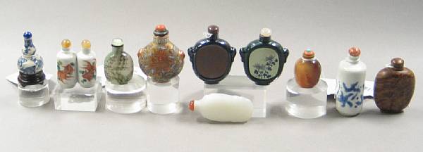 Appraisal: Ten snuff bottles Including five porcelain and ceramic bottles three