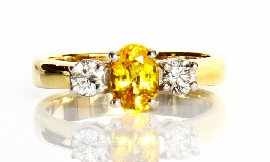 Appraisal: An ct gold yellow sapphire and diamond ring total estimated