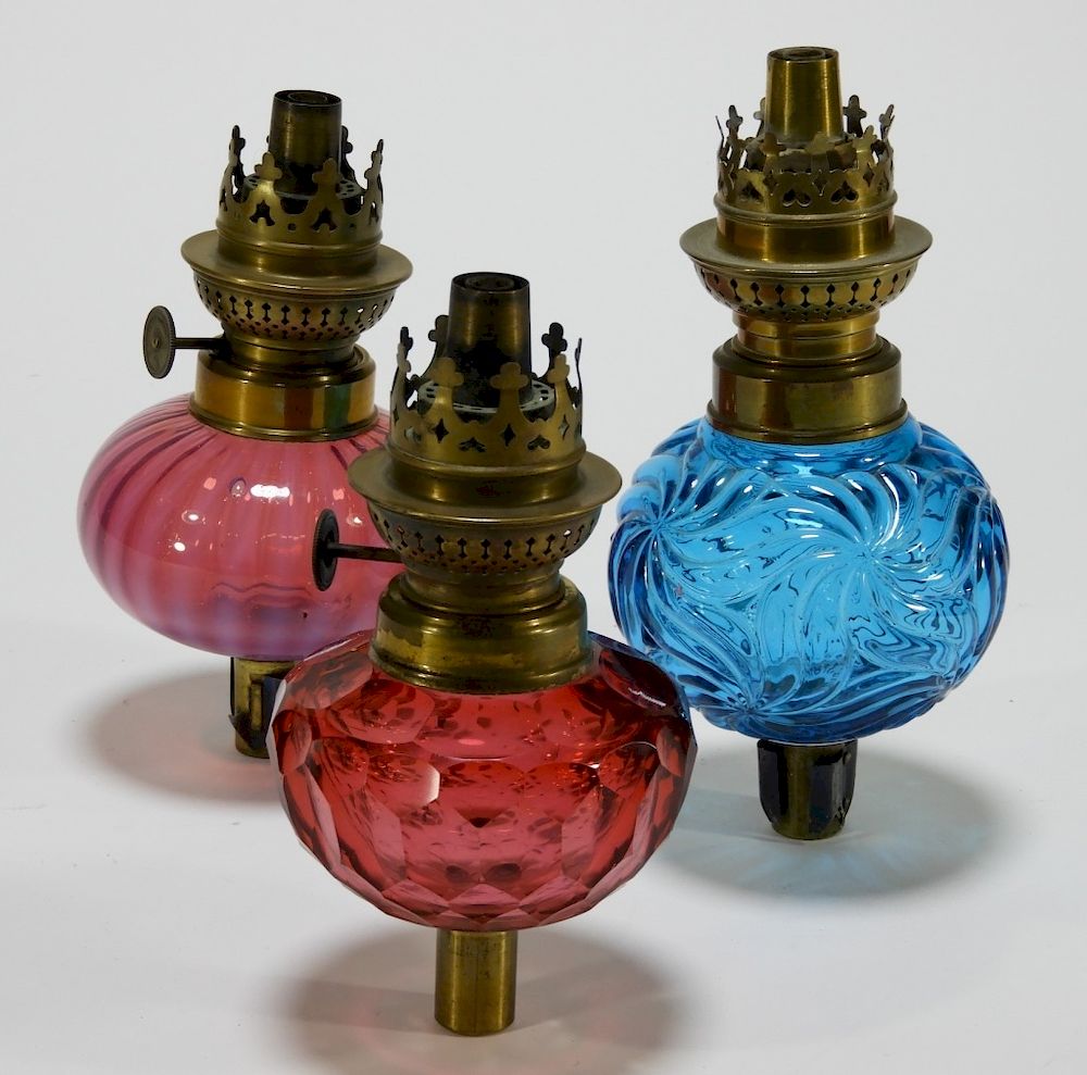 Appraisal: C Colored Blown Glass Whale Oil Peg Lamps United States