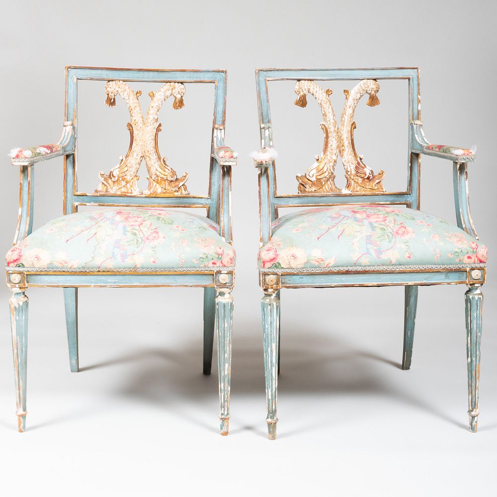 Appraisal: Pair of Italian Neoclassical Style Blue Painted and Parcel-Gilt Armchairs