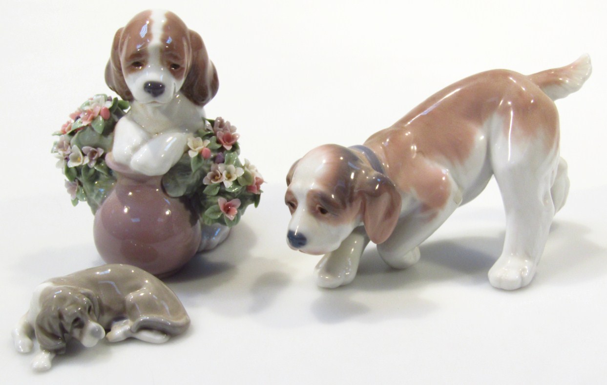 Appraisal: Various Lladro figures comprising a puppy aside vase of flowers