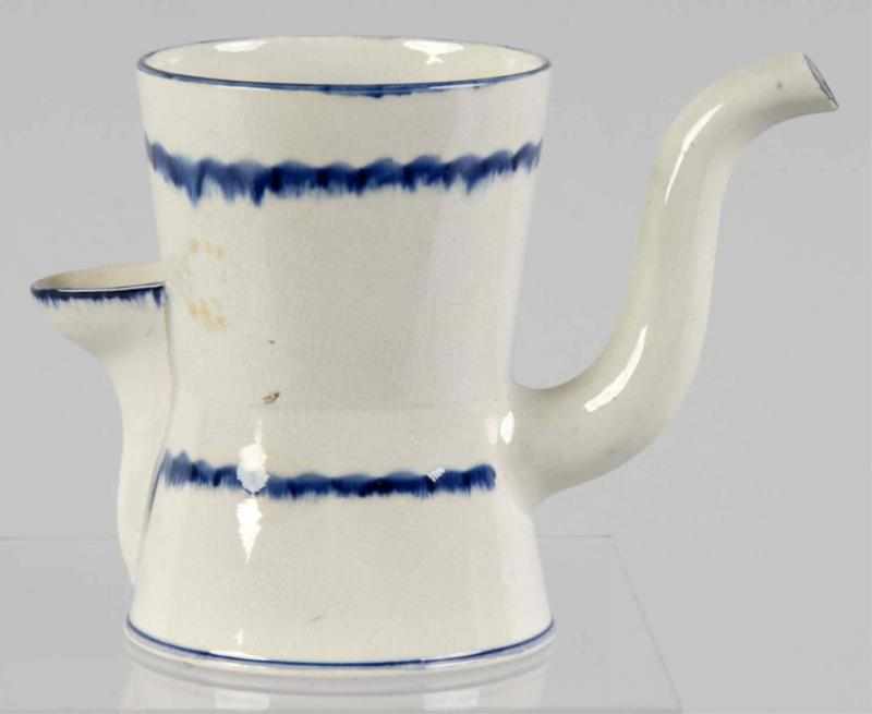 Appraisal: Double-Spouted Argyle Wedgewood Pitcher Description Extremely rare Used for warming