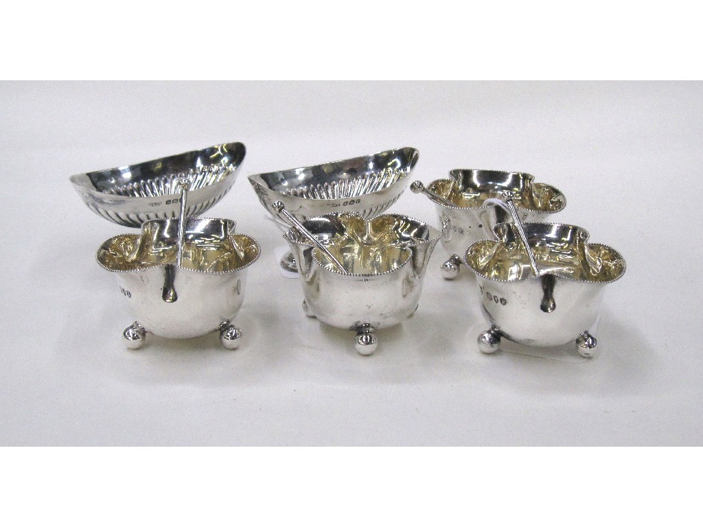 Appraisal: Lot comprising set of four silver salts and a pair